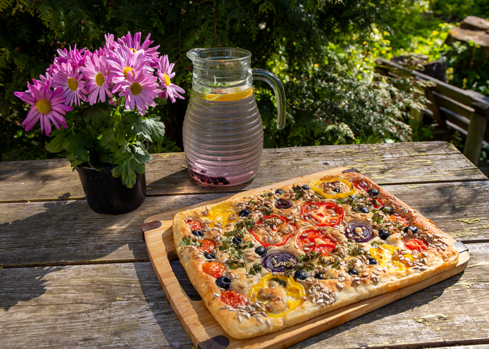 Focaccia bread served in a garden