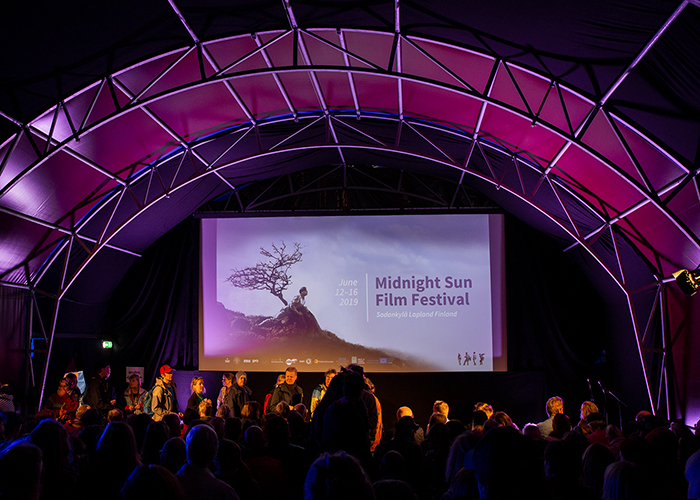 the audience entering a film screening at Midnight Sun Film Festival